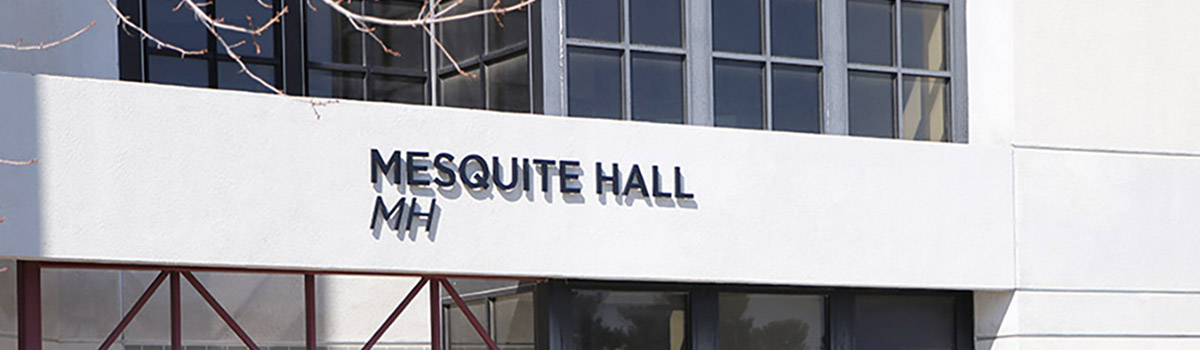 Sign above Mesquite Hall building entrance.