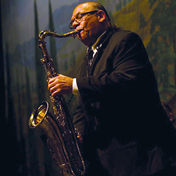 Lee Matalon playing a saxaphone