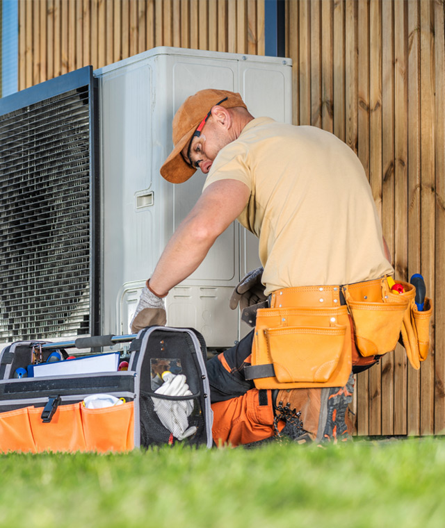 HVAC Working on Unit