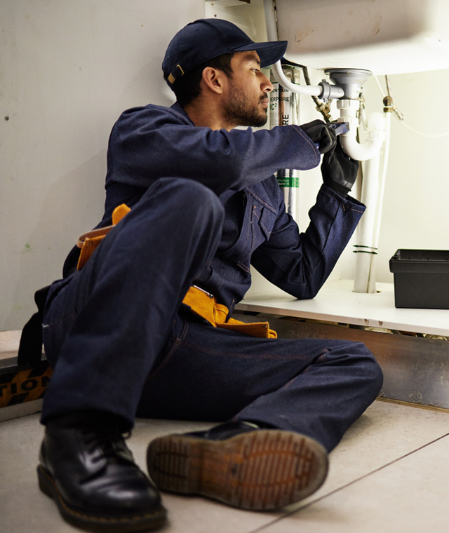 Plumber at work
