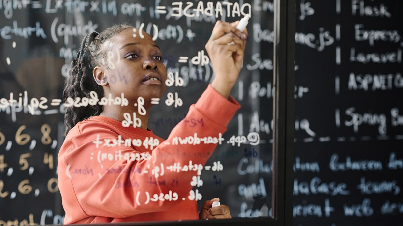 Student working on math equation
