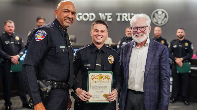 AVC alumnus Bruno Starling holds his certificate after being sworn in as a Law Enforcement Officer with the Lancaster Police Department