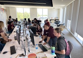 Antelope Valley College staff assist students with registration. 