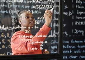 Student working on math equation