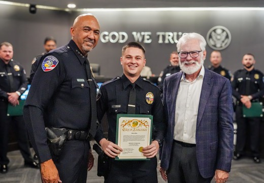 AVC alumnus Bruno Starling holds his certificate after being sworn in as a Law Enforcement Officer with the Lancaster Police Department