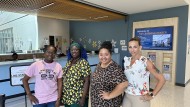 The Learning Center team stands by their front counter in Sage Hall. 