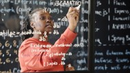 Student working on math equation
